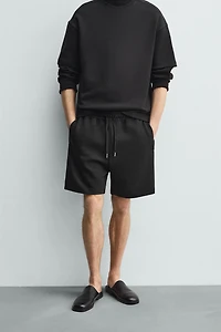 RELAXED FIT INTERLOCK JOGGER SHORTS