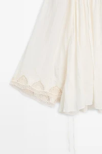 Embroidered flowing blouse