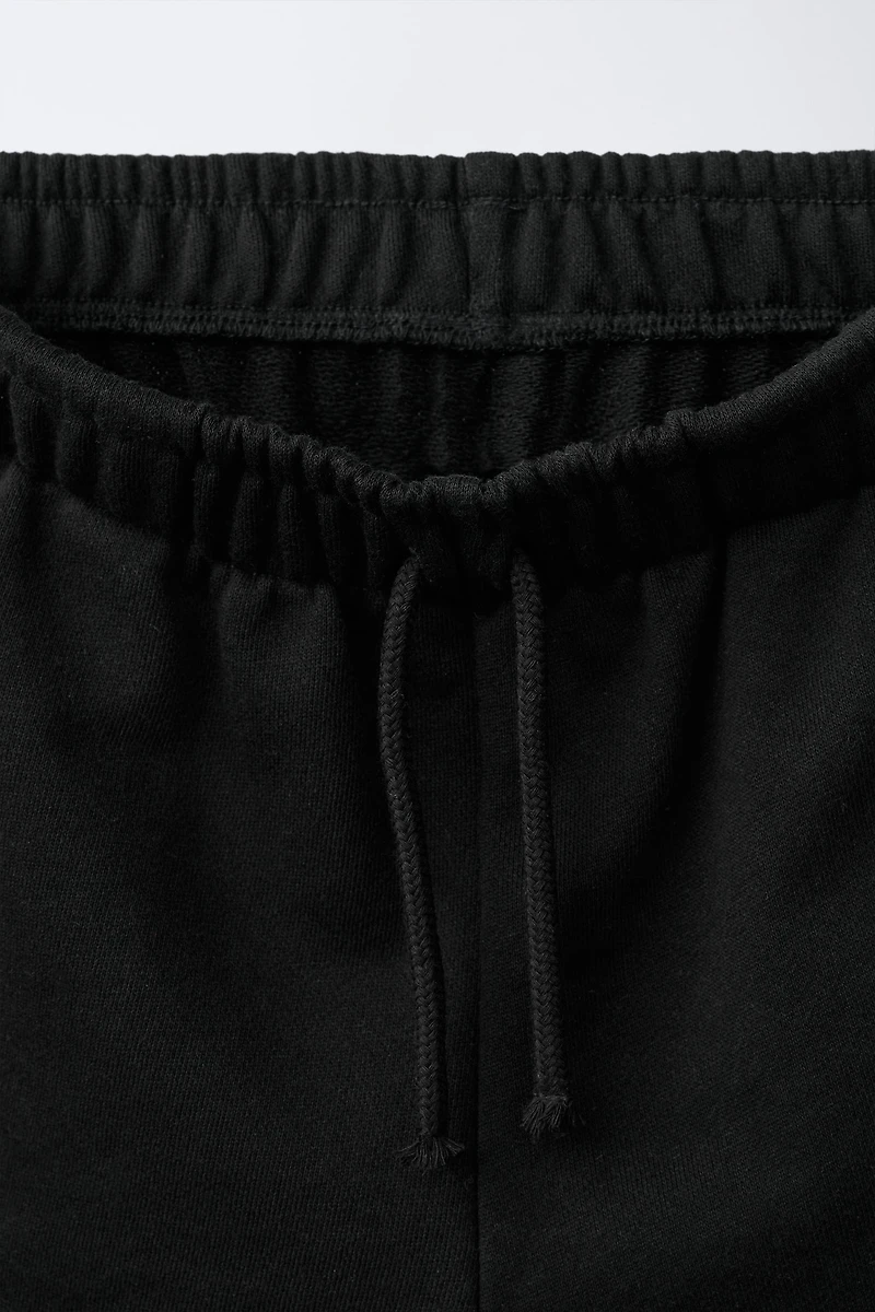 STAR PATCH PLUSH SHORTS
