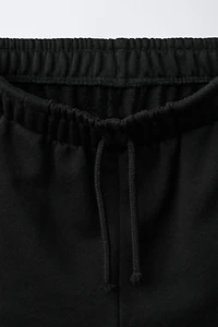 STAR PATCH PLUSH SHORTS
