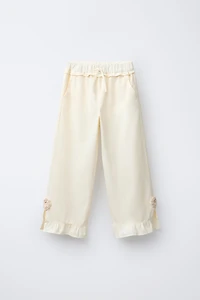 WIDE LEG PANTS WITH CROCHET FLOWER RUFFLES