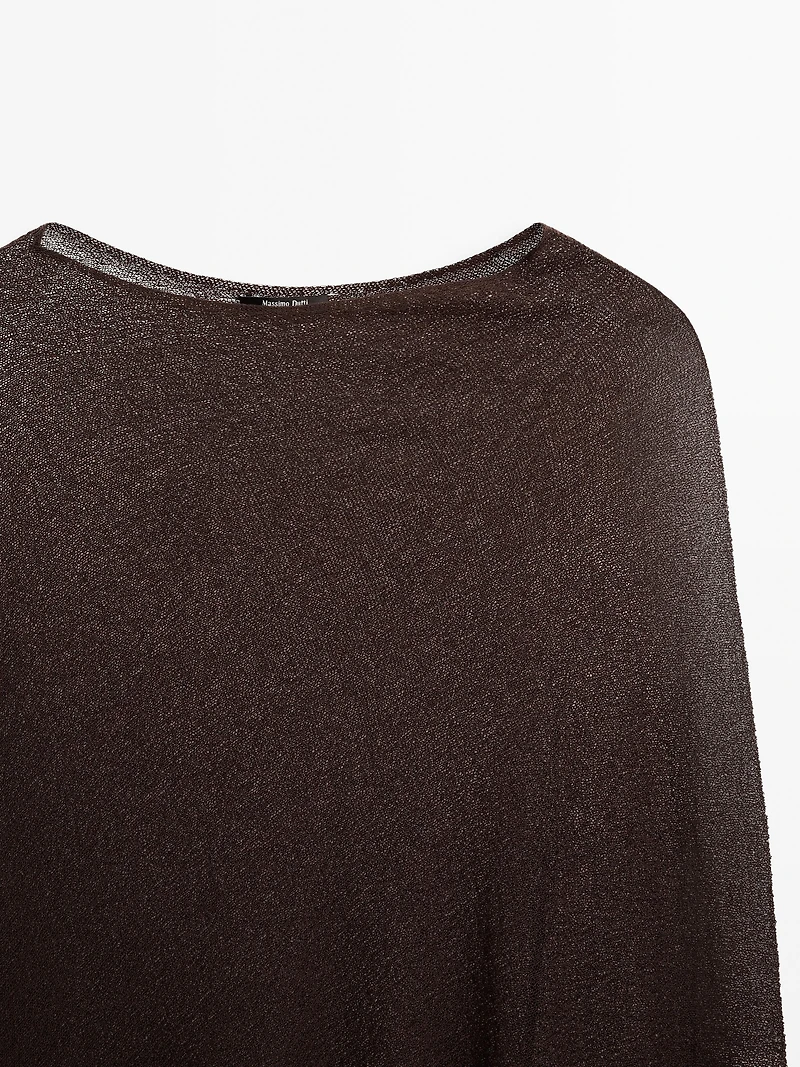 Cape en maille coupe asymétrique