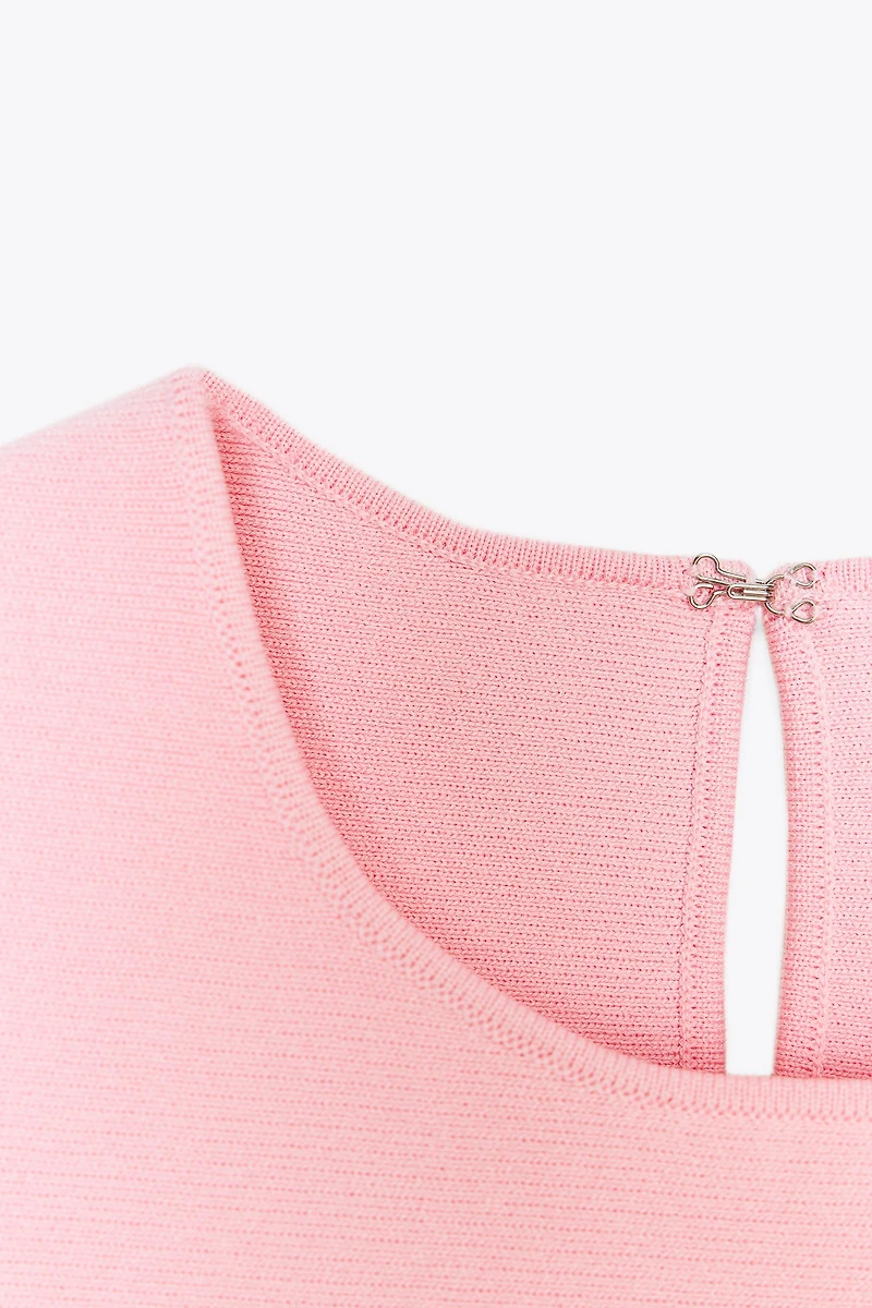 TIE-DETAIL PEPLUM KNIT TOP