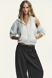PINSTRIPE PLEATED BALLOON PANTS