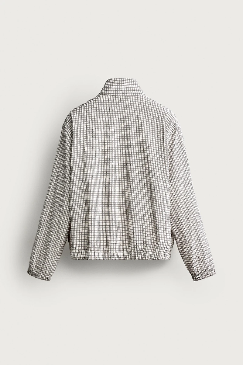 BLOUSON COURT À CARREAUX