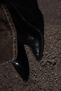 COWBOY HEELED ANKLE BOOTS