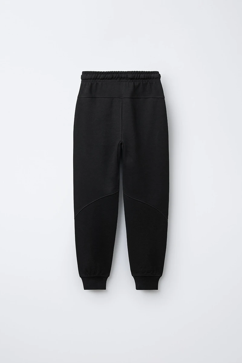 PIQUÉ COMBINATION INTERLOCK PLUSH PANTS
