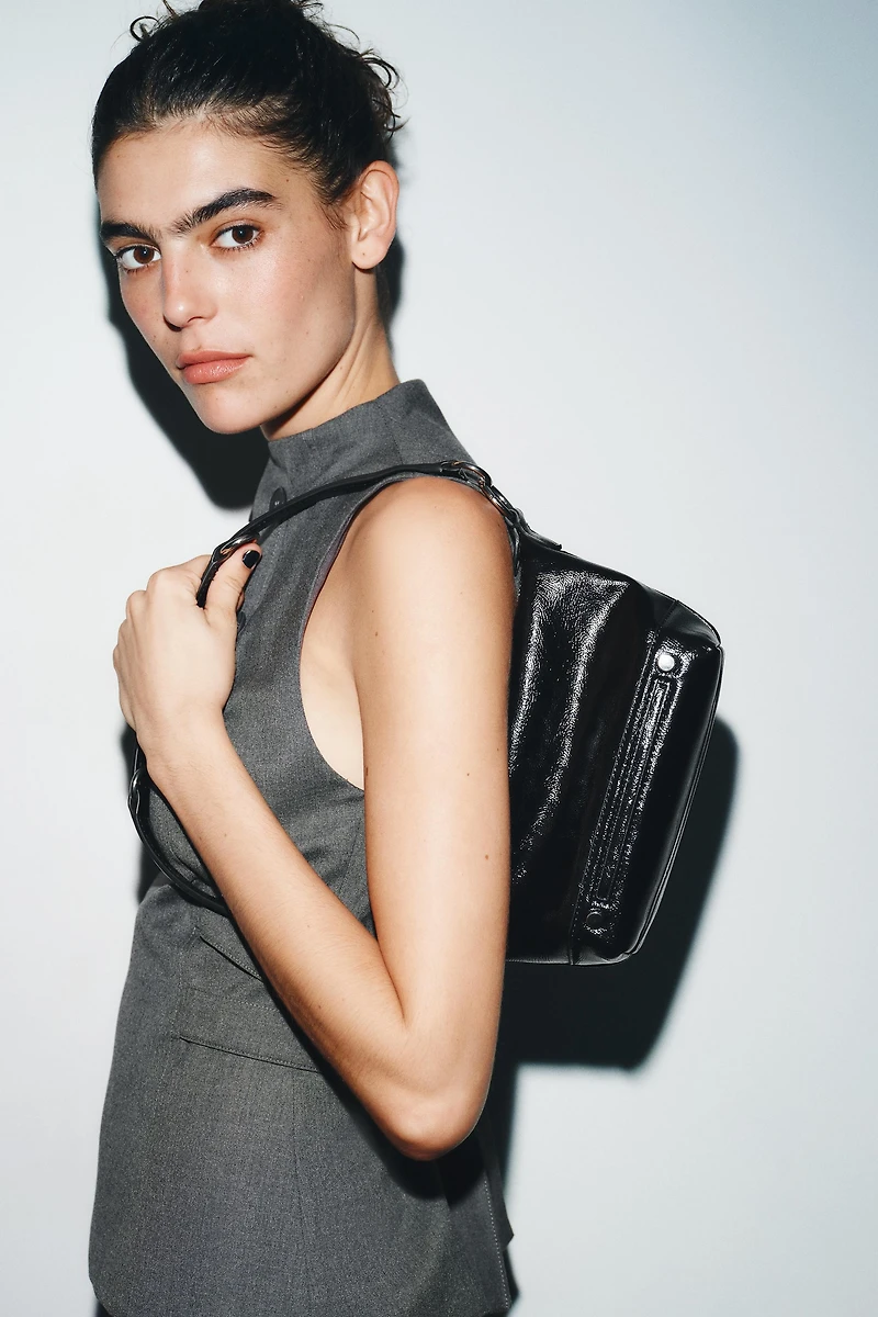 MULTIPOSITION SHOULDER BAG