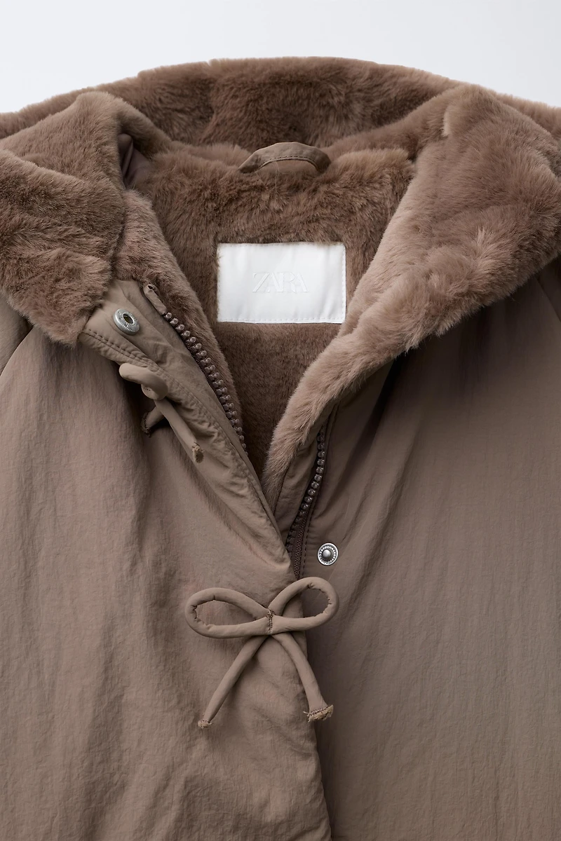 WATER REPELLENT PUFFER COAT WITH BOWS
