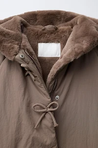 WATER REPELLENT PUFFER COAT WITH BOWS