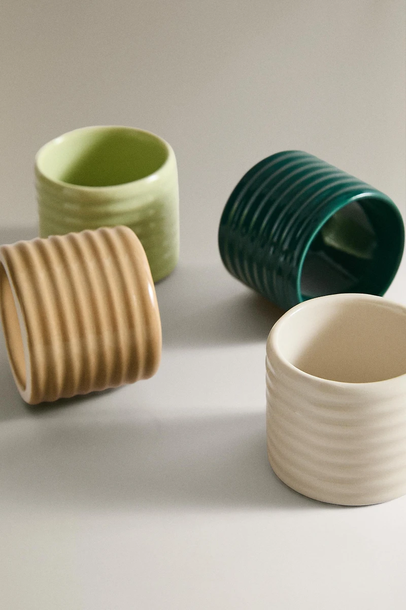 PACK OF CERAMIC NAPKIN HOLDERS WITH RELIEF (PACK OF 4)