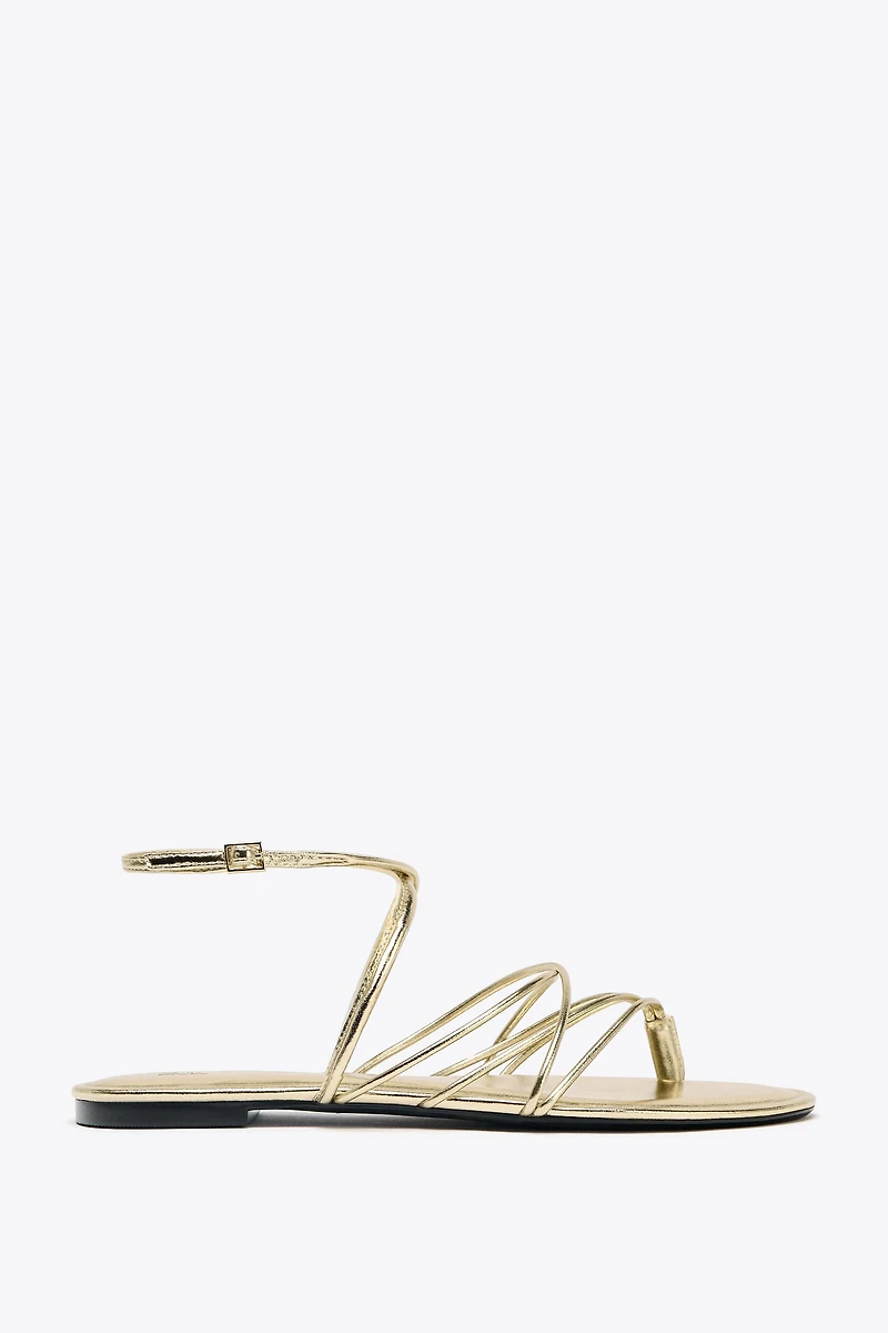 GOLD STRAPPY FLAT SANDALS