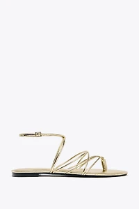 GOLD STRAPPY FLAT SANDALS