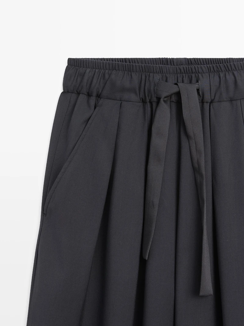Pantalon large volume à plis