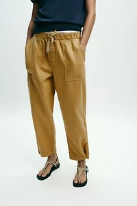 JOGGER PANTS WITH BUTTONED HEM
