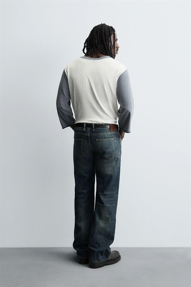 LOW RISE FLARE FIT JEANS