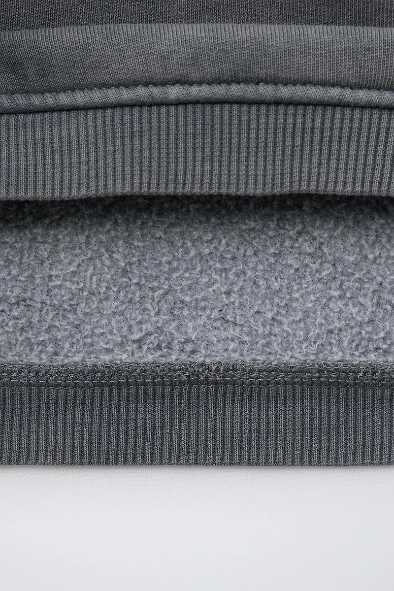 SWEAT EFFET DÉLAVÉ BRODÉ