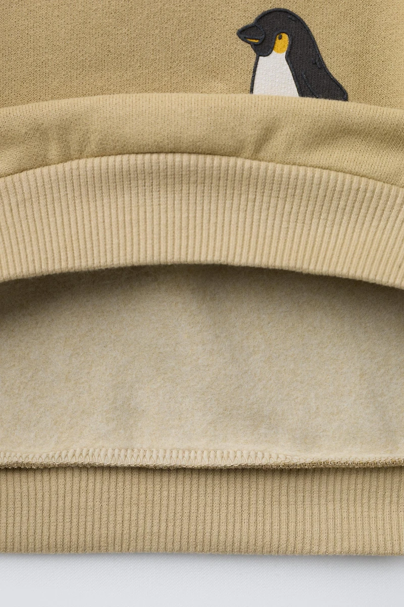 ANIMAL PRINT SWEATSHIRT