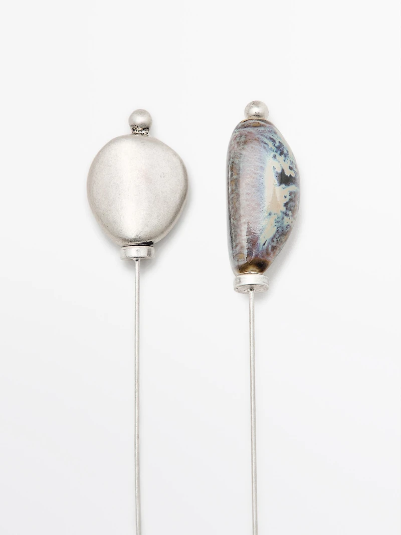 Brooch with ceramic leaf piece
