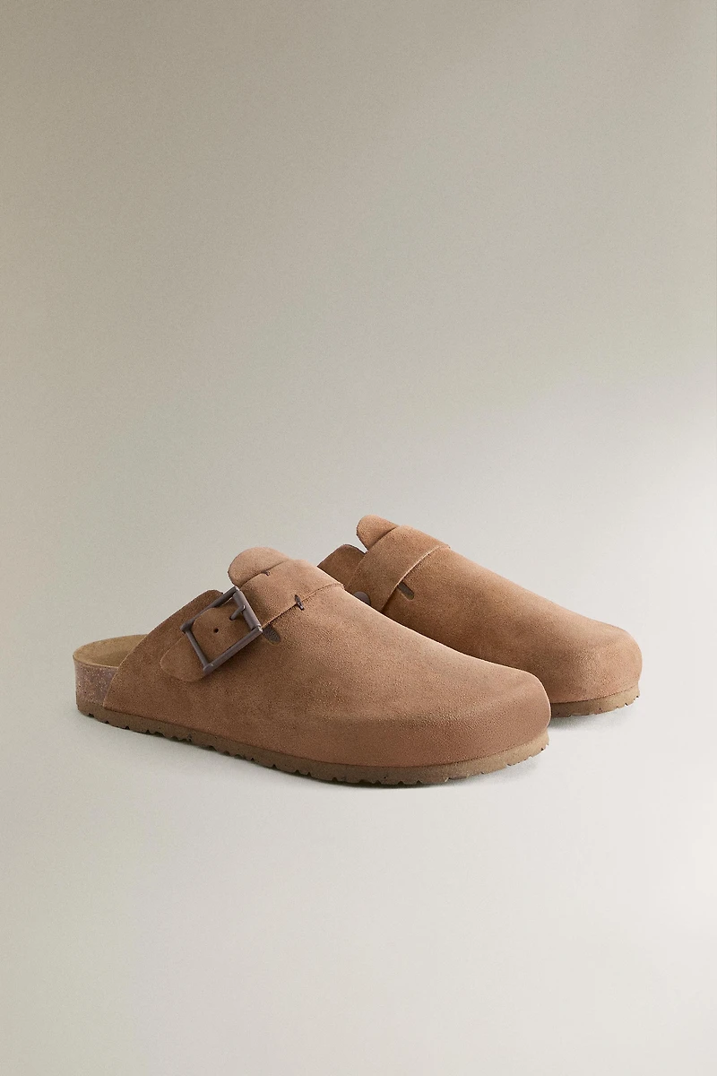SABOT CUIR BOUCLE DÉTAIL SURPIQÛRE
