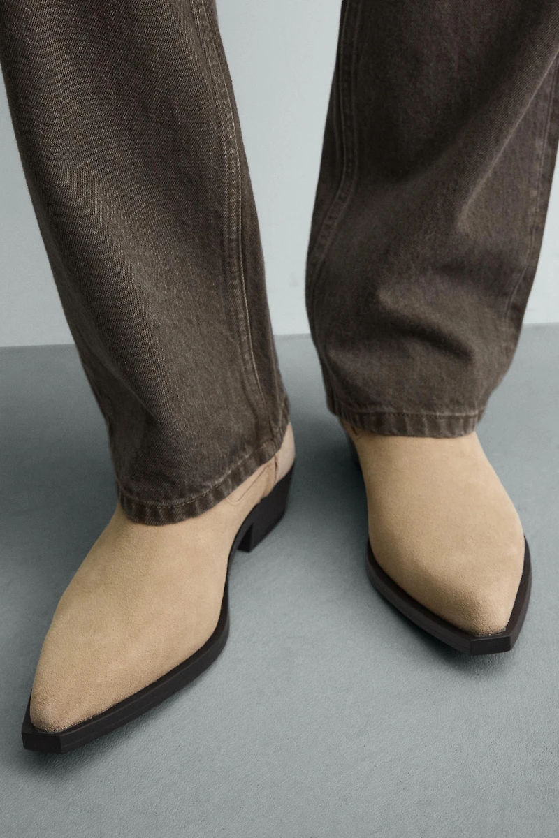 BOTTINES EN CUIR À HARNAIS