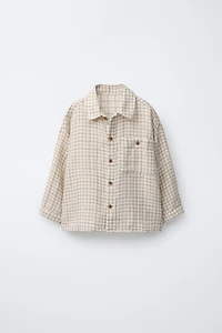 CHEMISE À CARREAUX ET POCHE