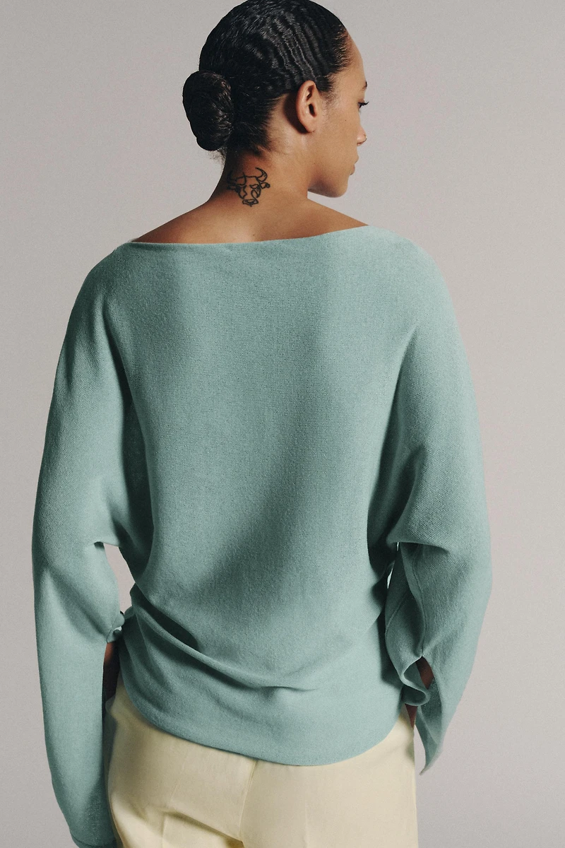PULL EN MAILLE AVEC OUVERTURES SUR MANCHES
