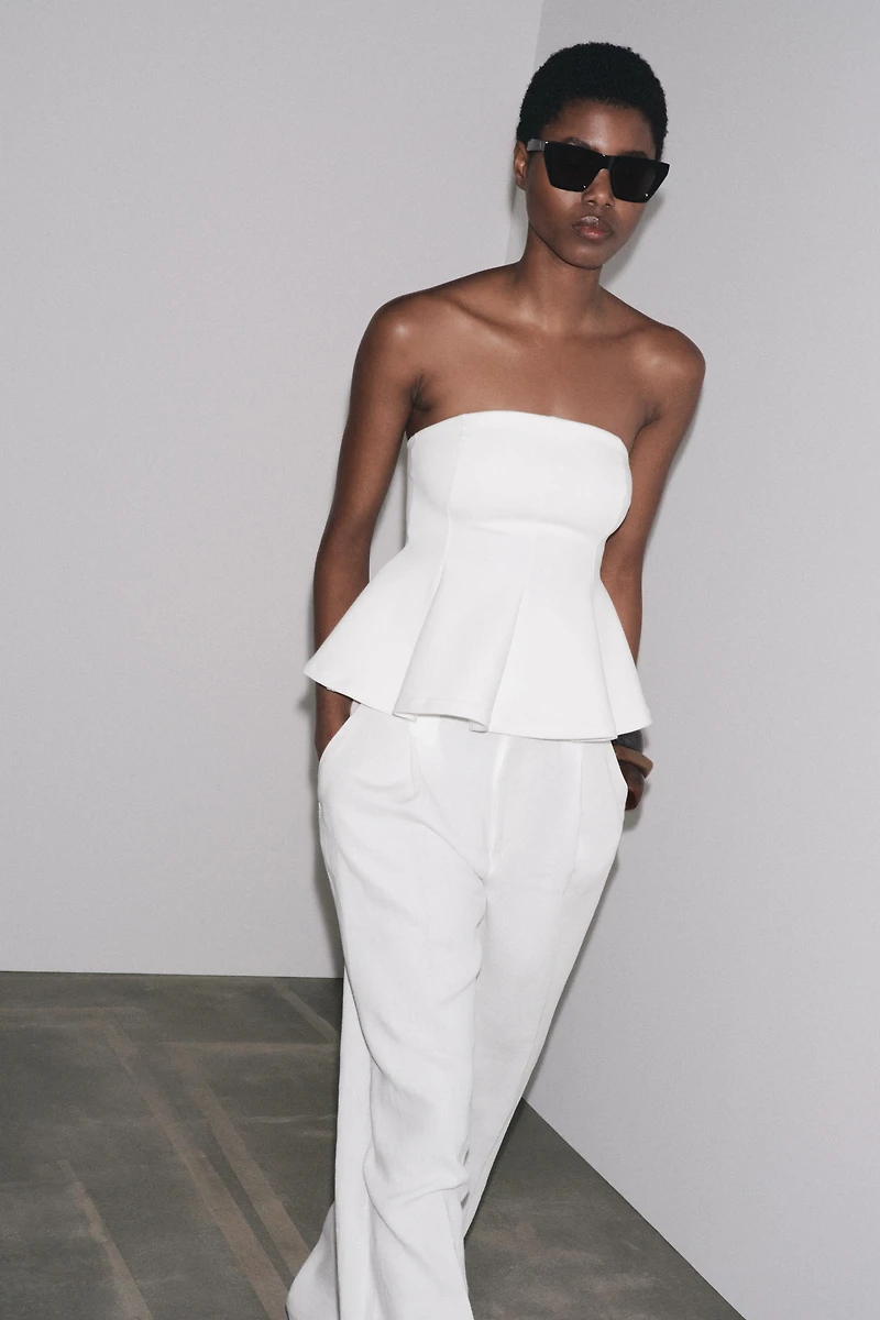 INTERLOCK PEPLUM TOP