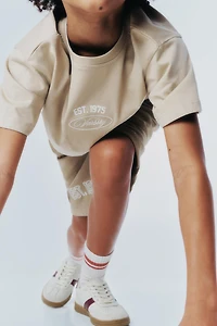 VARSITY JOGGING T-SHIRT
