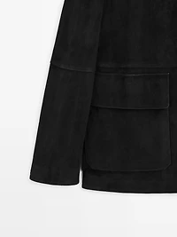 Veste avec poches en cuir finition daim