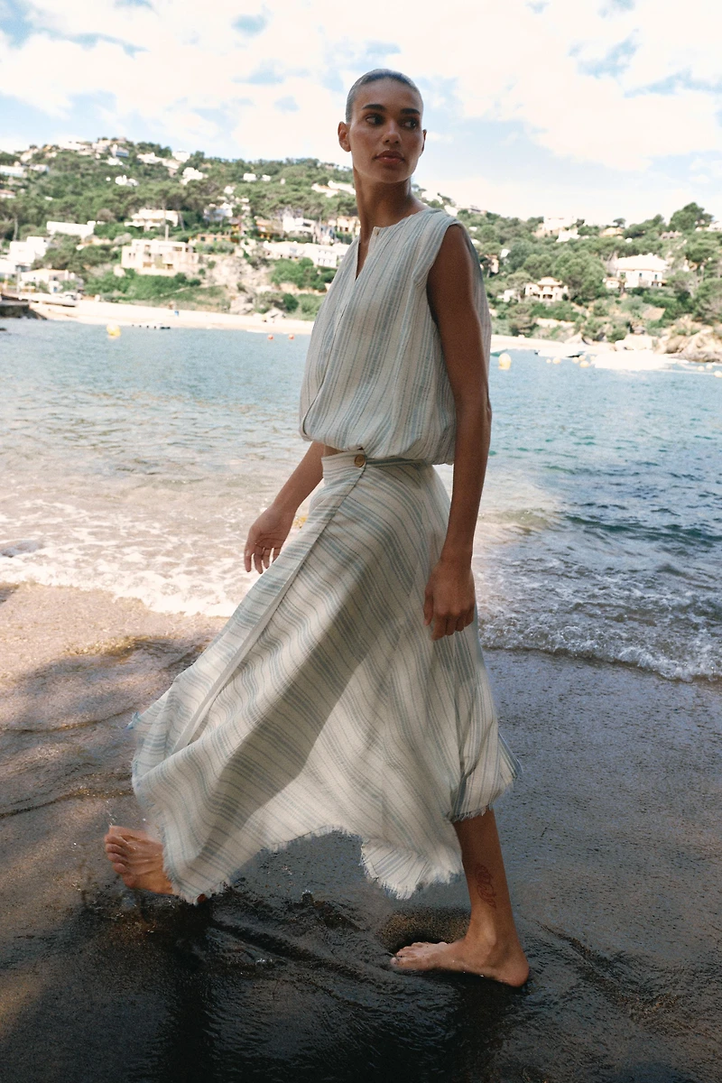 ASYMMETRIC MIDI SKIRT