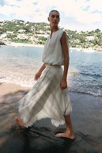 ASYMMETRIC MIDI SKIRT