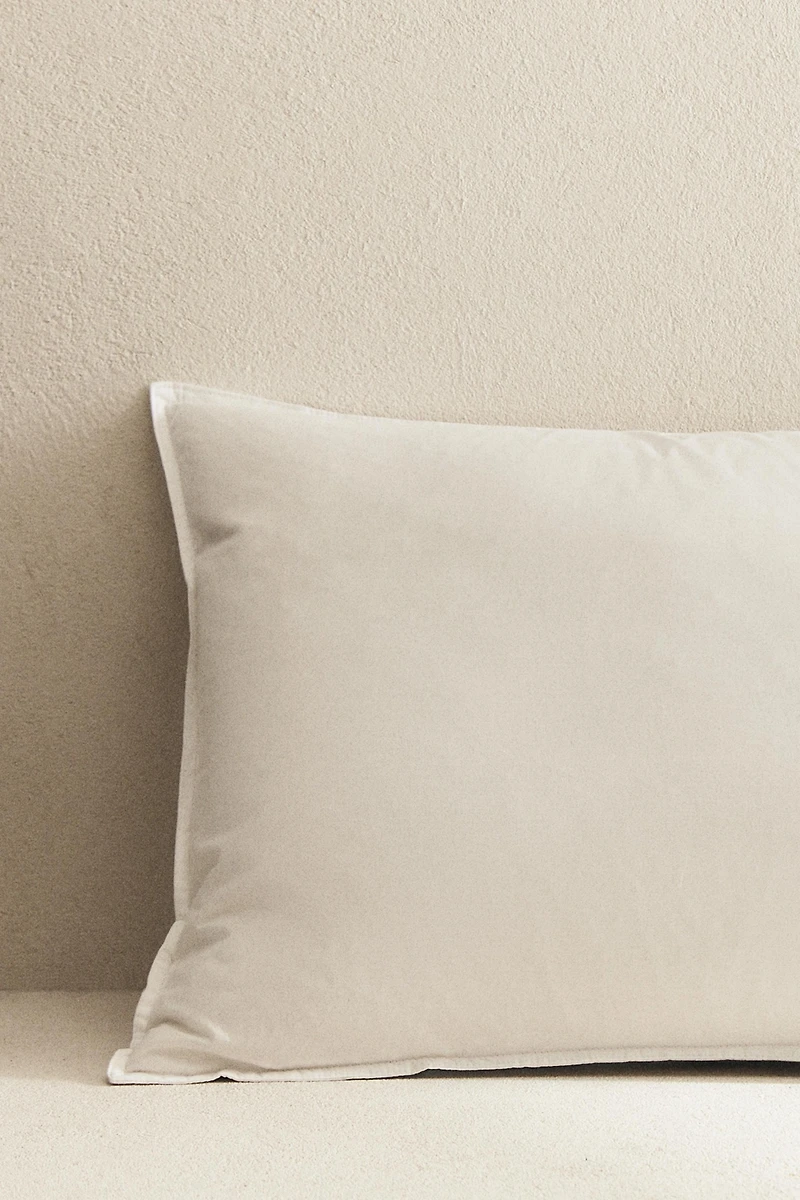 FEATHER CUSHION FILLING WITH A COTTON COVER