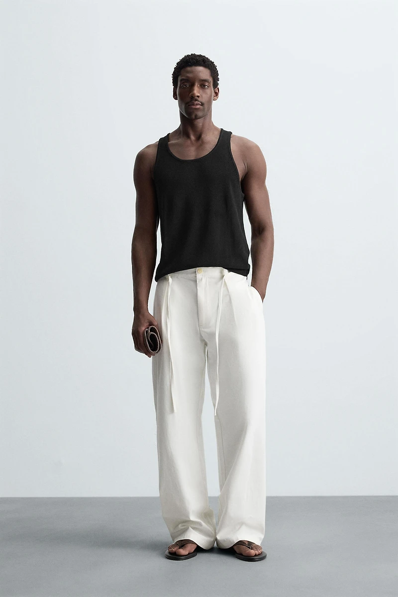 RELAXED FIT PLEATED PANTS