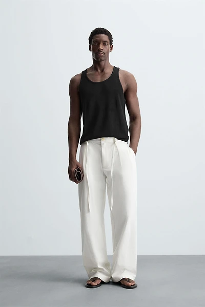 RELAXED FIT PLEATED PANTS