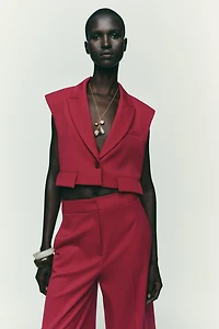 SHORT VEST WITH FLAPS