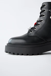 LACED ANKLE BOOTS WITH CHARMS