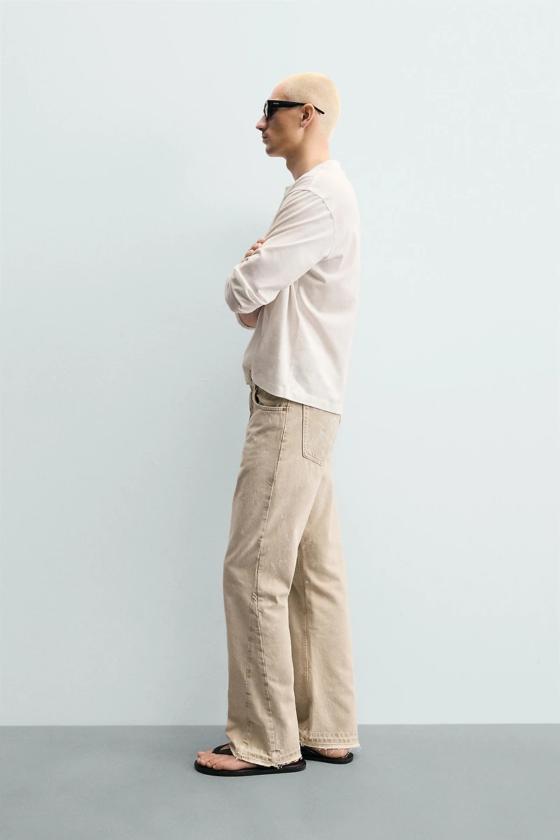 PAINT SPLATTER FLARE FIT JEANS