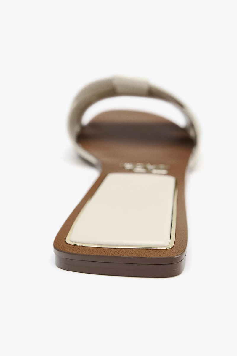FLAT CROSSED LEATHER SANDALS