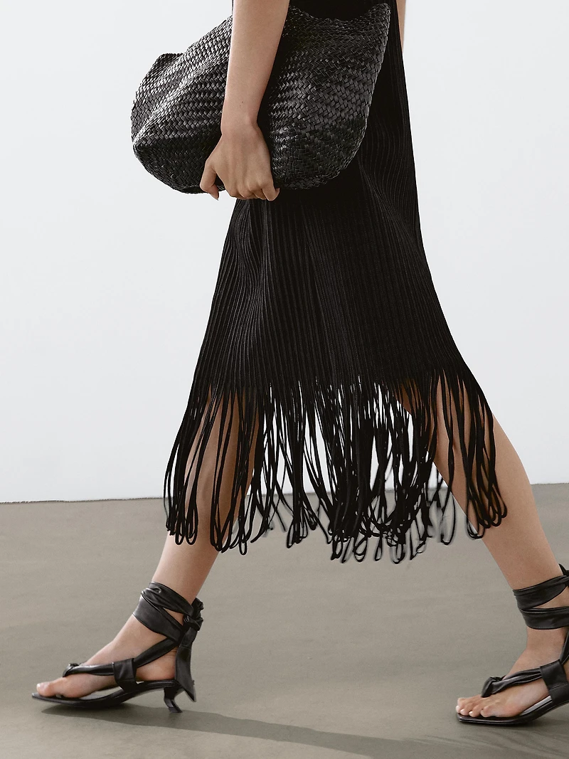 Textured knit dress with fringed hem