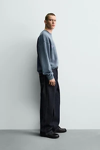 WASHED SWEATSHIRT WITH PRINTED TEXTS