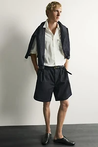 RELAXED FIT PLEATED CHINO DENIM SHORTS