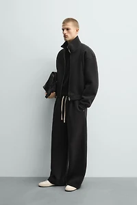 TECHNICAL PLEATED JOGGER PANTS