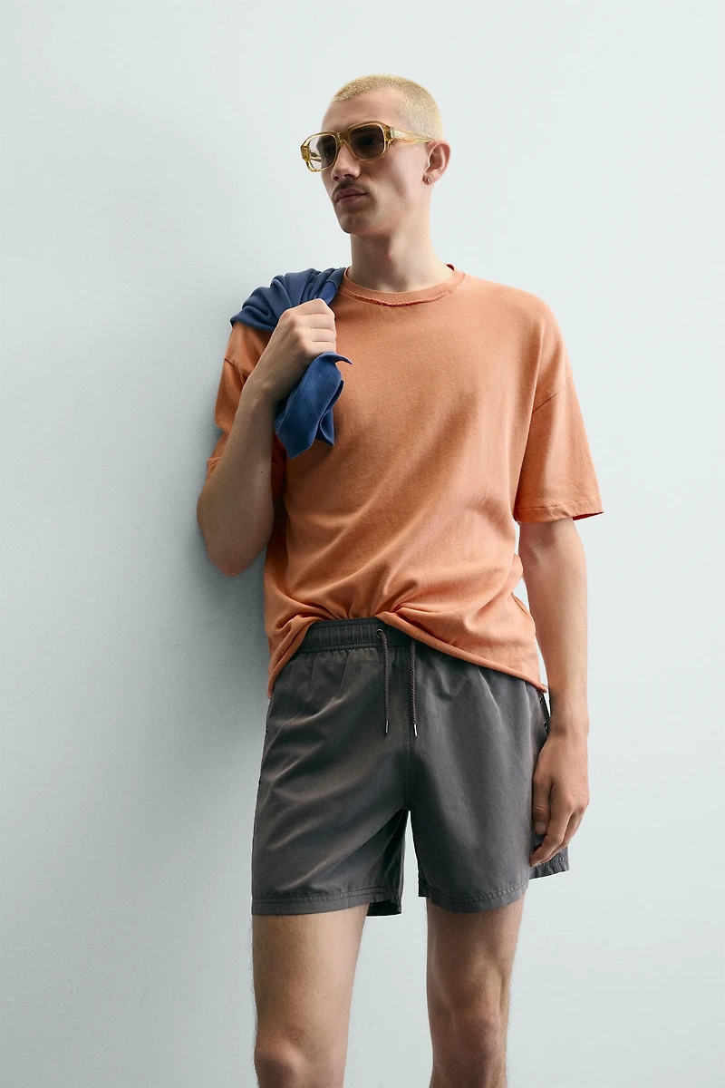 IRREGULAR FINISH KNIT T-SHIRT