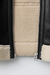 DOUBLE FACED FAUX LEATHER SHEARLING JACKET