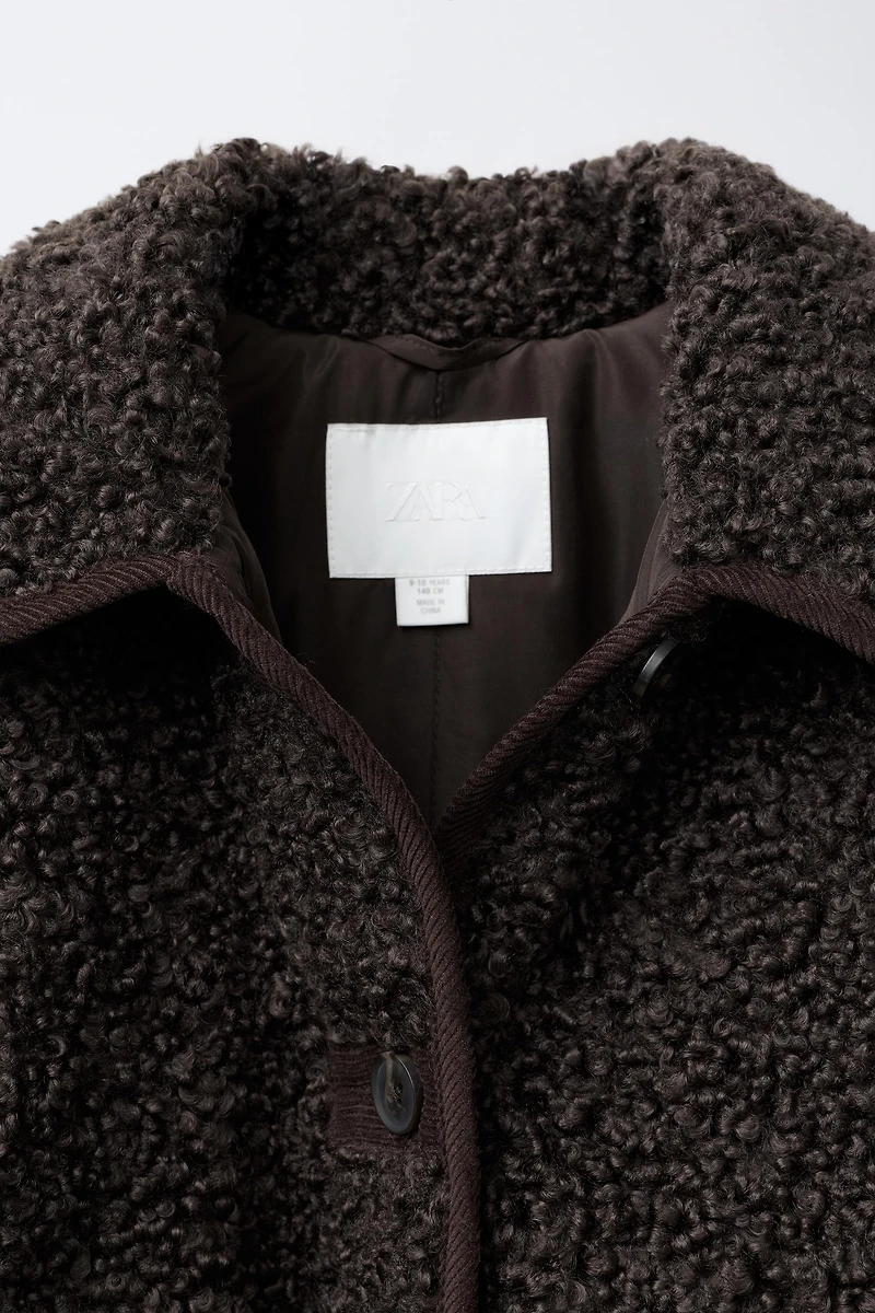 PIPED SHEARLING COAT