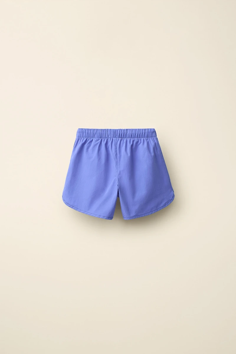 SWIM SHORTS CREATED BY CARAMEL LONDON X ZARA