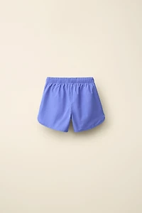 SWIM SHORTS CREATED BY CARAMEL LONDON X ZARA