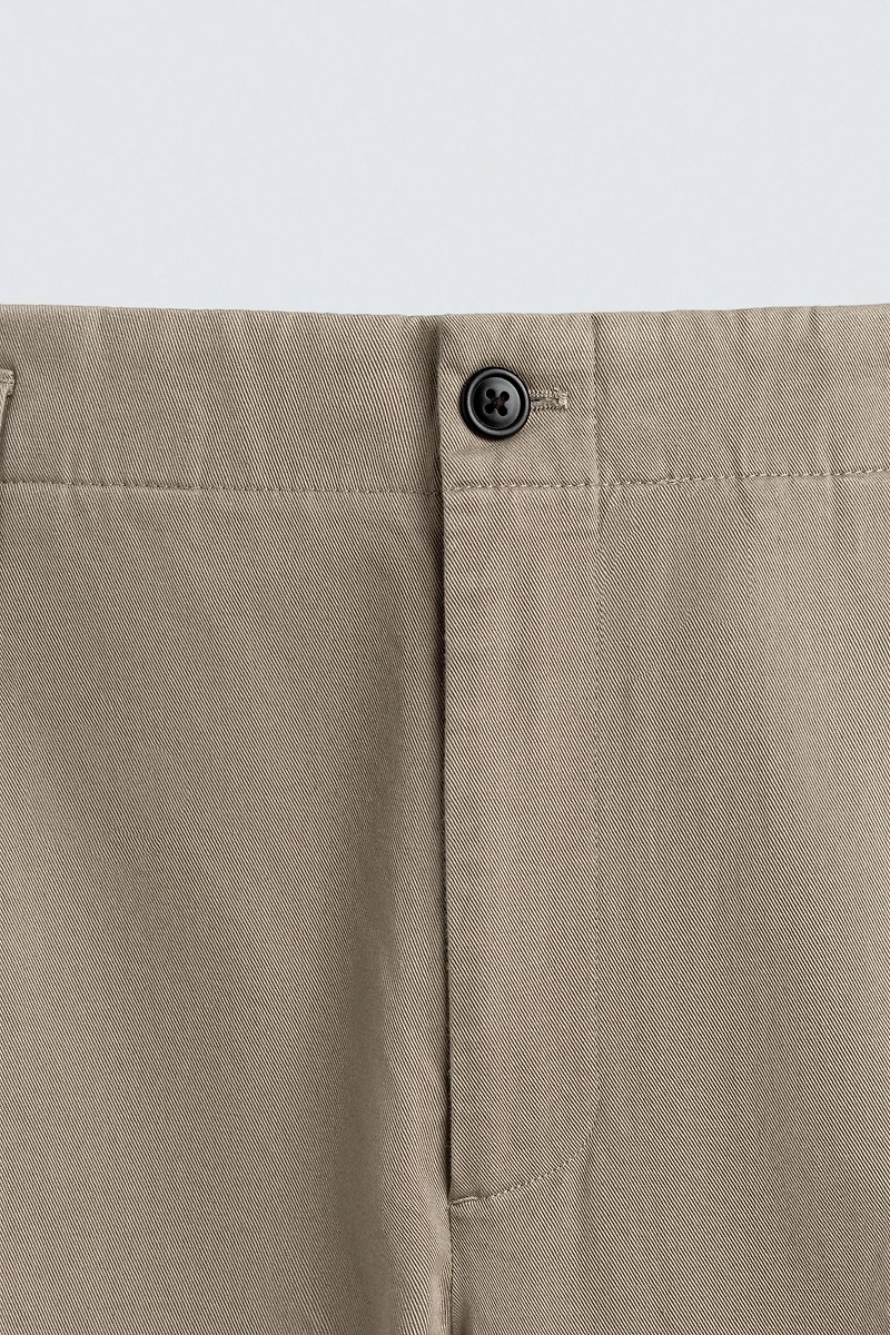 PLEATED CHINO PANTS