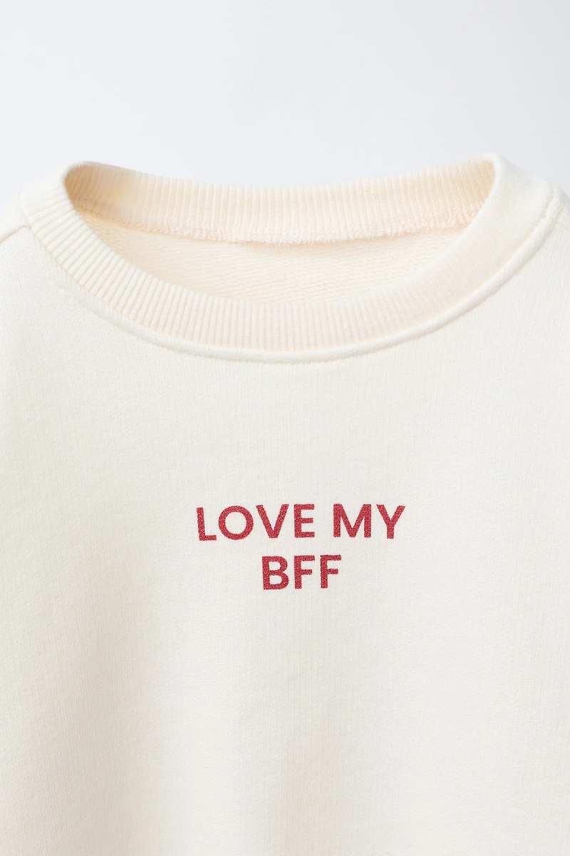 TEXT HEARTS SWEATSHIRT